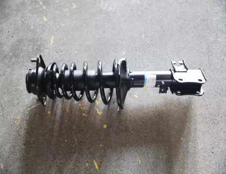 Front shock absorber left  Autoworld